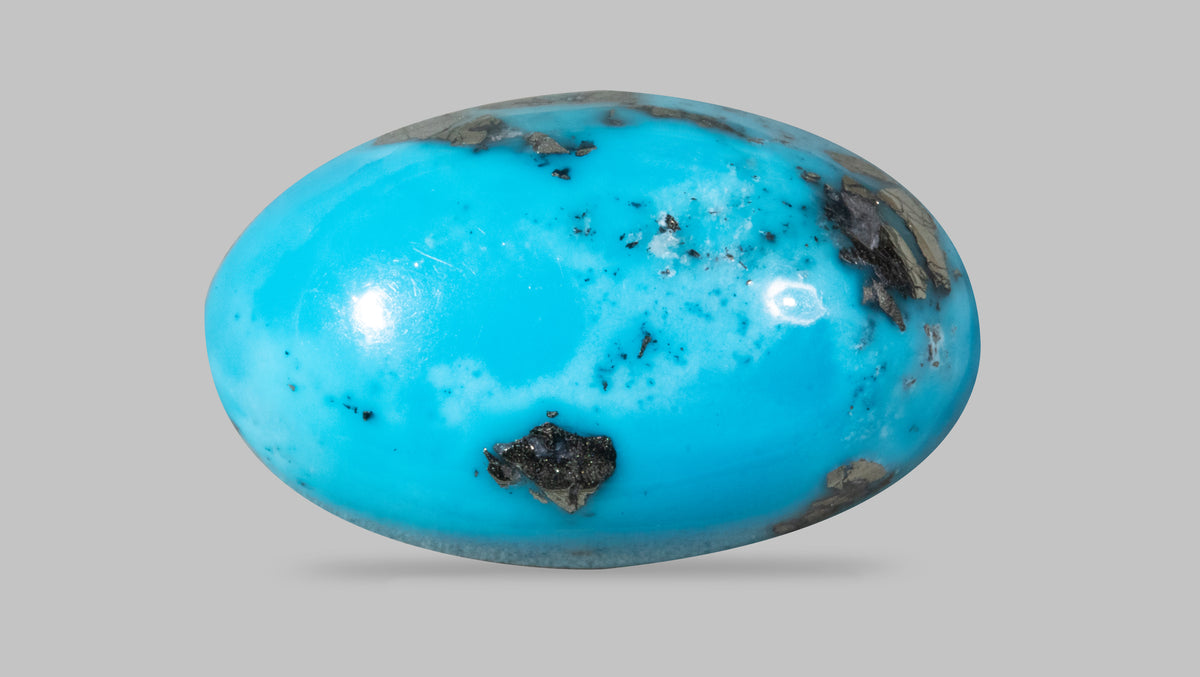 Irani Firoza (Turquoise) 19.28 Carats / 21.19 Ratti