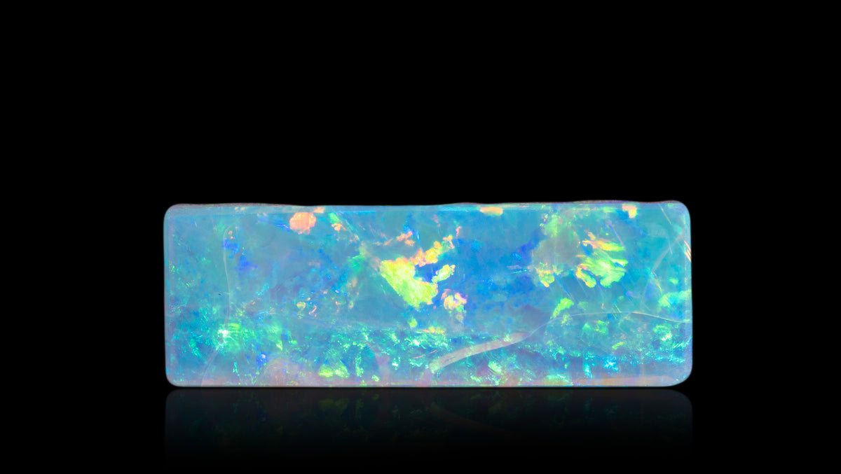 White Opal With Fire 6.75 Carats / 7.42 Ratti