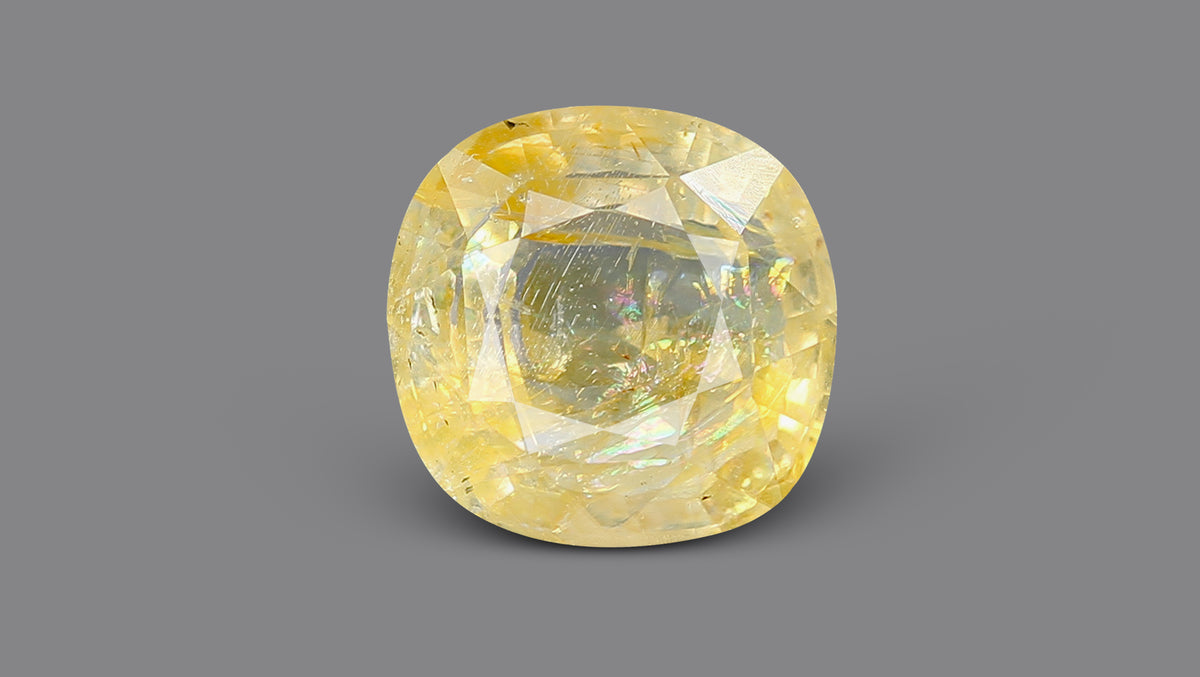 YELLOW TOPAZ 6.35 CARATS / 6.98 Ratti