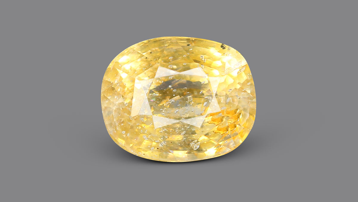 YELLOW TOPAZ 8.64 CARATS / 9.49 Ratti