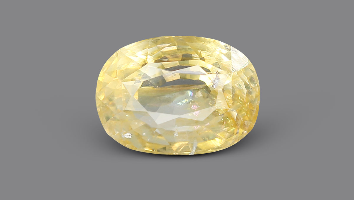 YELLOW TOPAZ 6.50 CARATS / 7.14 Ratti