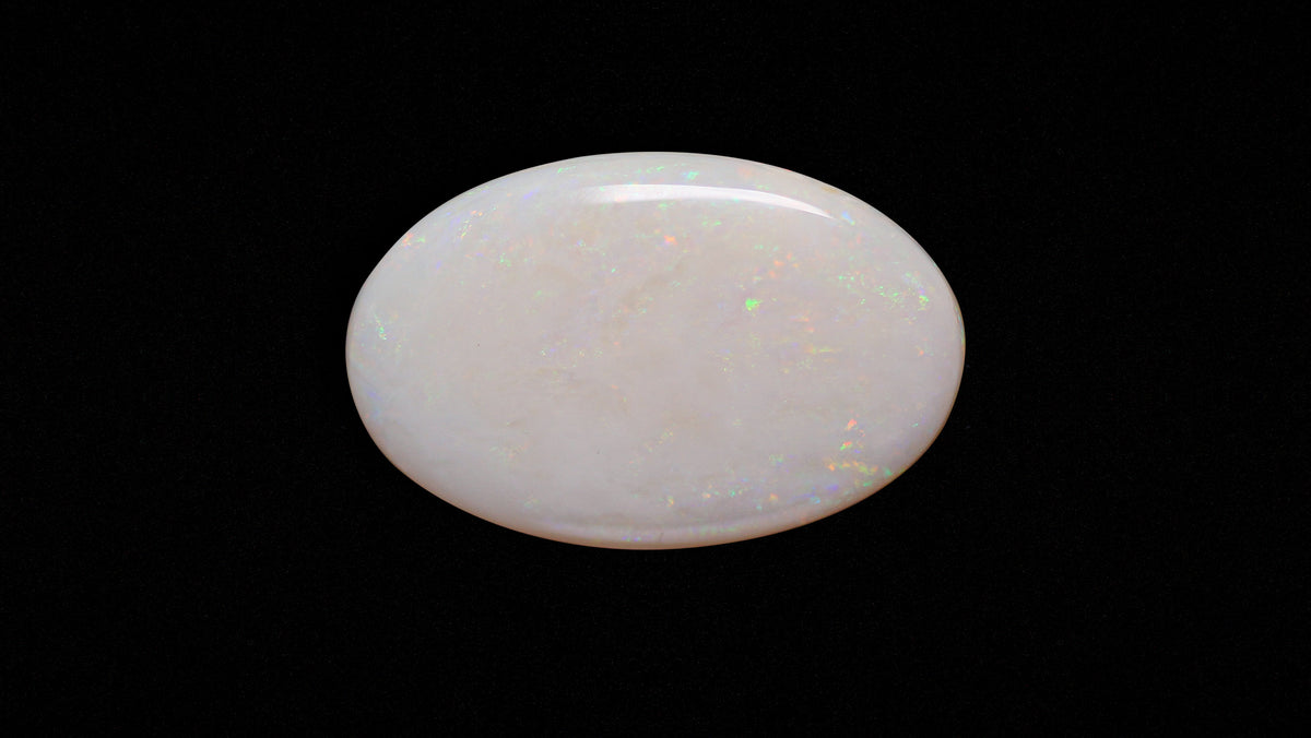 White Opal With Fire 20.23 Carats / 22.23 Ratti