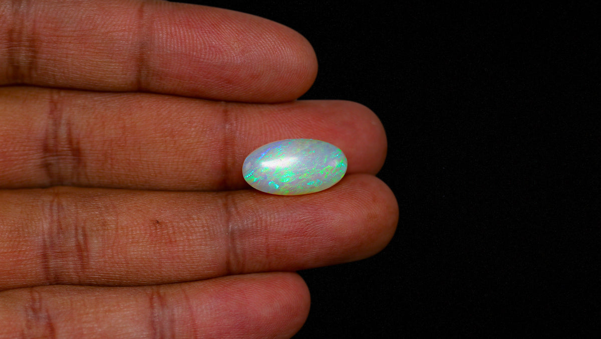 White Opal With Fire 6.44 Carats / 7.15 Ratti