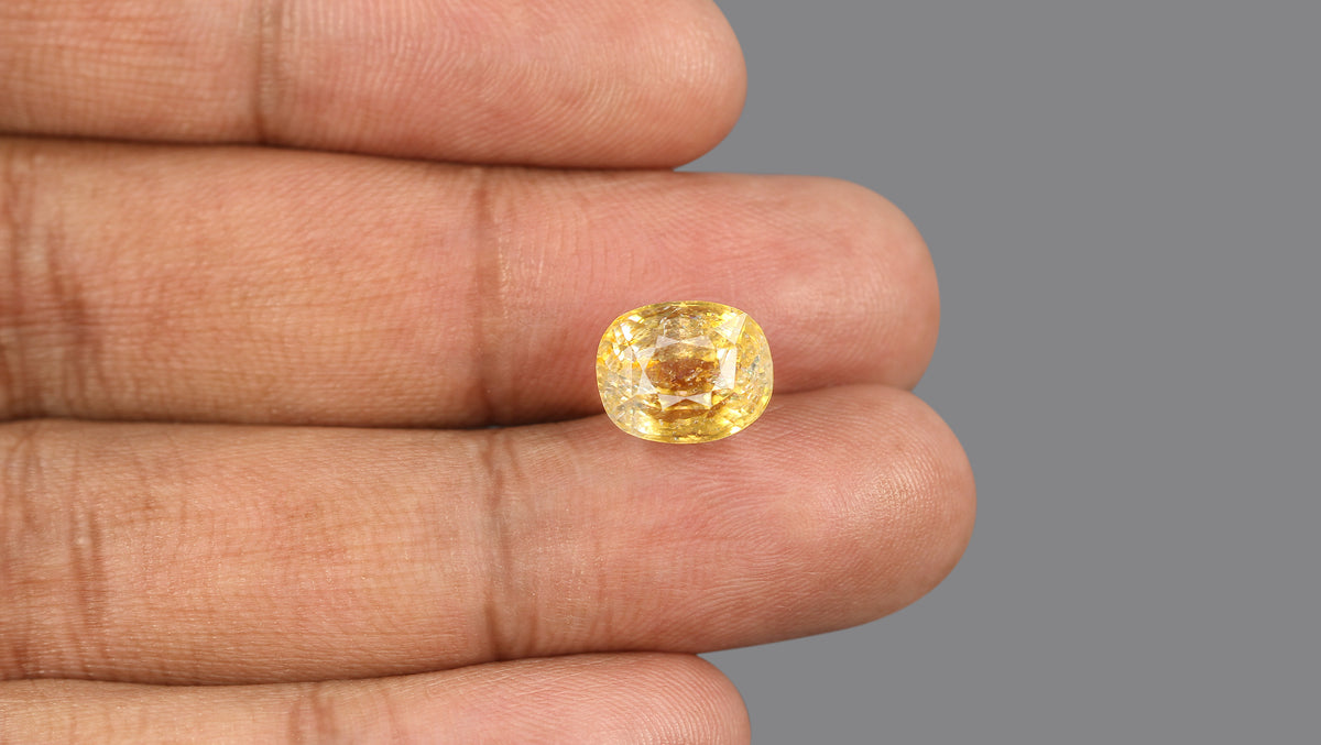 YELLOW TOPAZ 8.64 CARATS / 9.49 Ratti