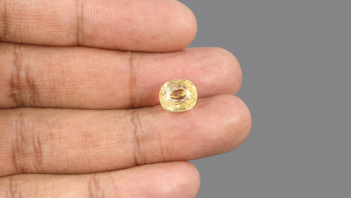YELLOW TOPAZ 6.29 CARATS / 6.91 Ratti