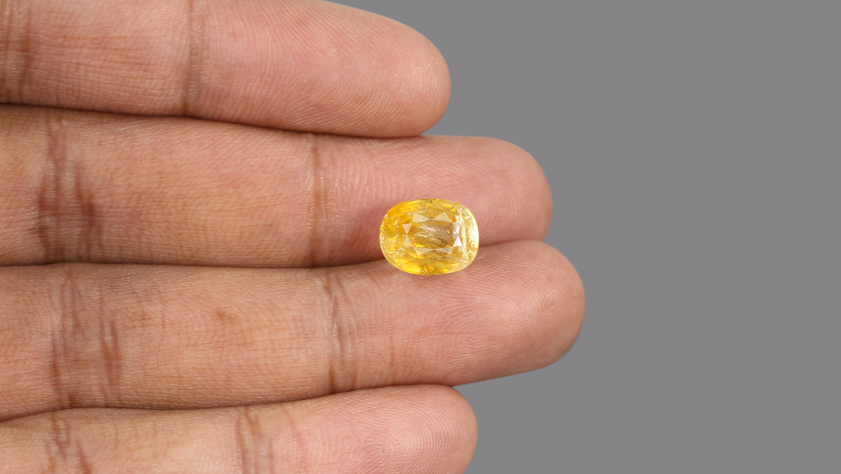 YELLOW TOPAZ 8.50 CARATS / 9.34 Ratti