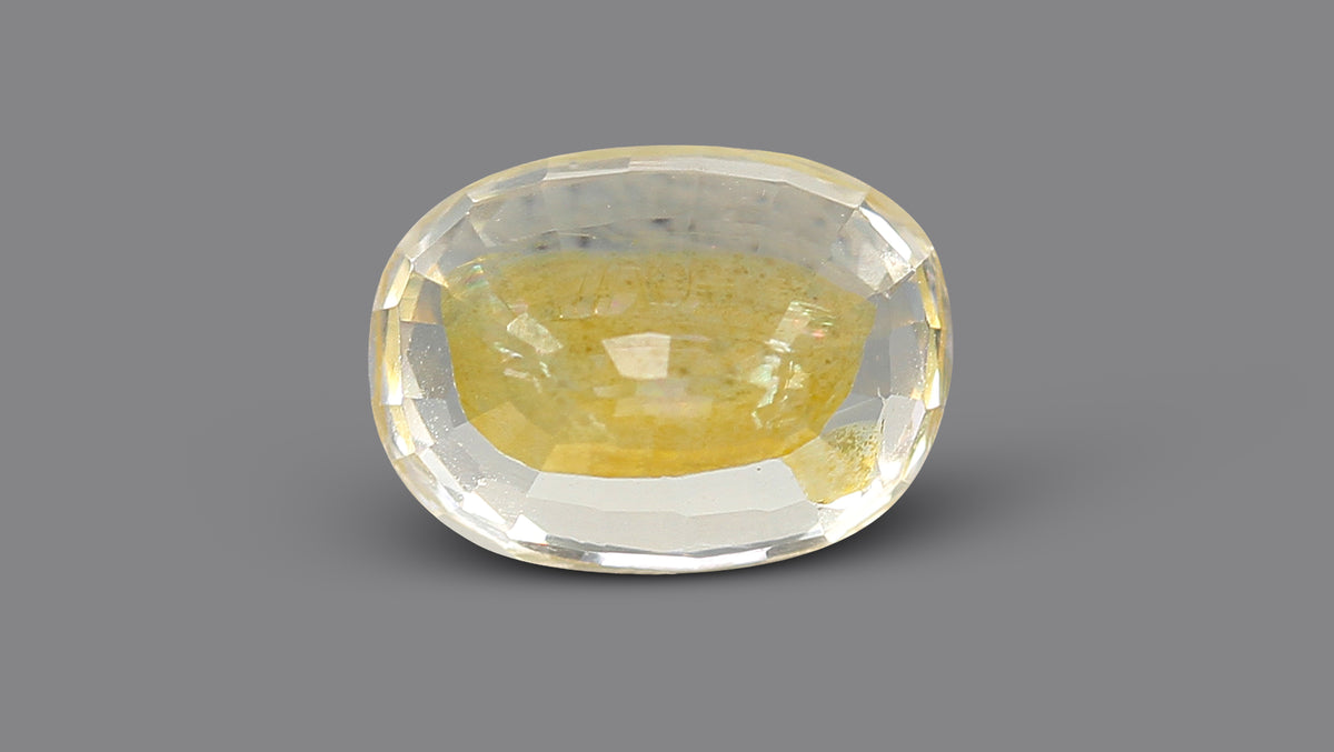 YELLOW TOPAZ 6.99 CARATS / 7.68 Ratti