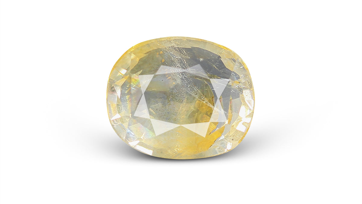 YELLOW TOPAZ 6.41 CARATS / 7.04 Ratti